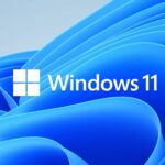 Windows 11 logo with text on an abstract blue background of curved shapes and gradients.